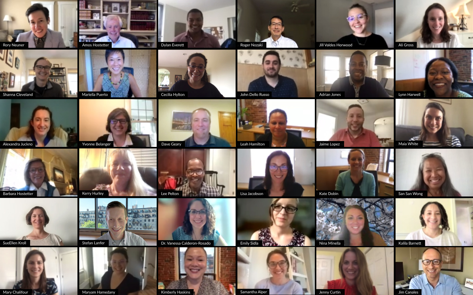 Screenshot of many Barr staff members smiling during a zoom call