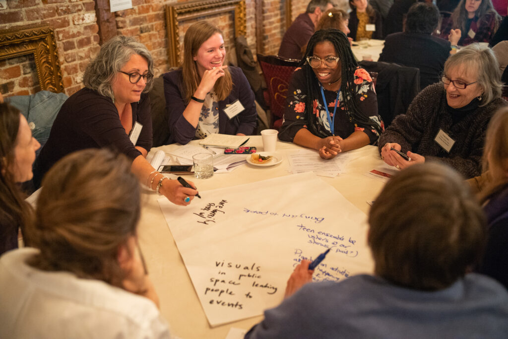 leaders meeting around a table