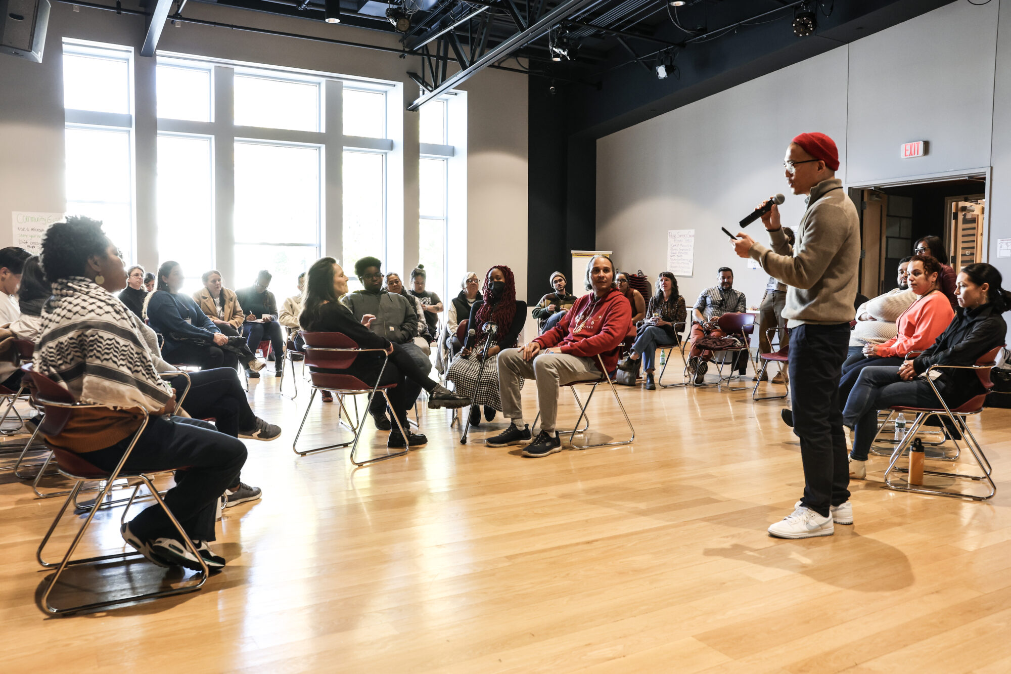 People gather at an arts convening.