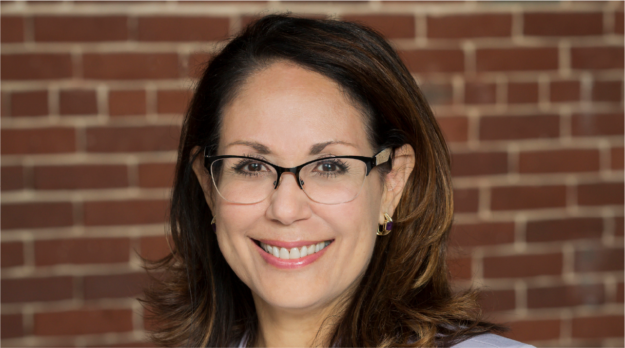 Vanessa Calderón-Rosado poses for a headshot.
