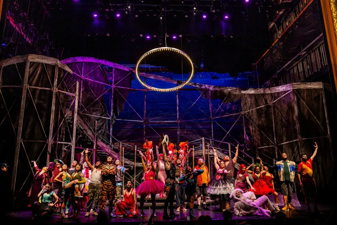 Cast members pose onstage after a performance of Carousel at the Boston Lyric Opera
